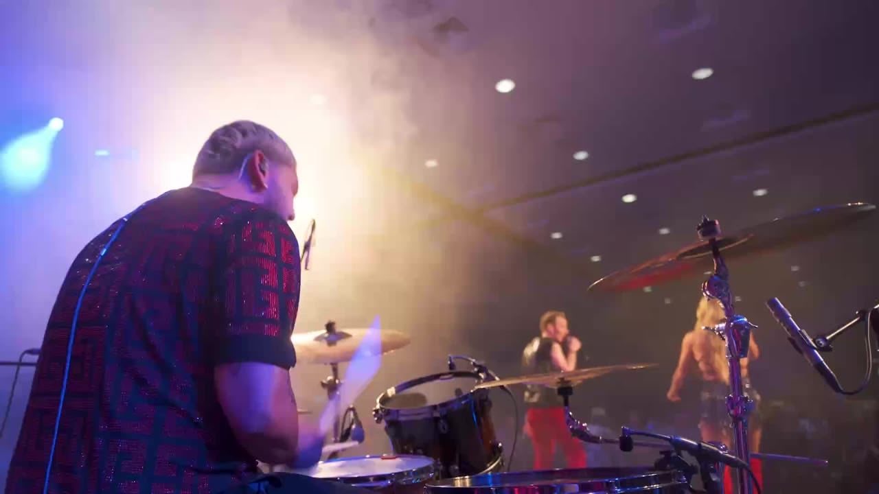 Corporate band drummer mid-set
