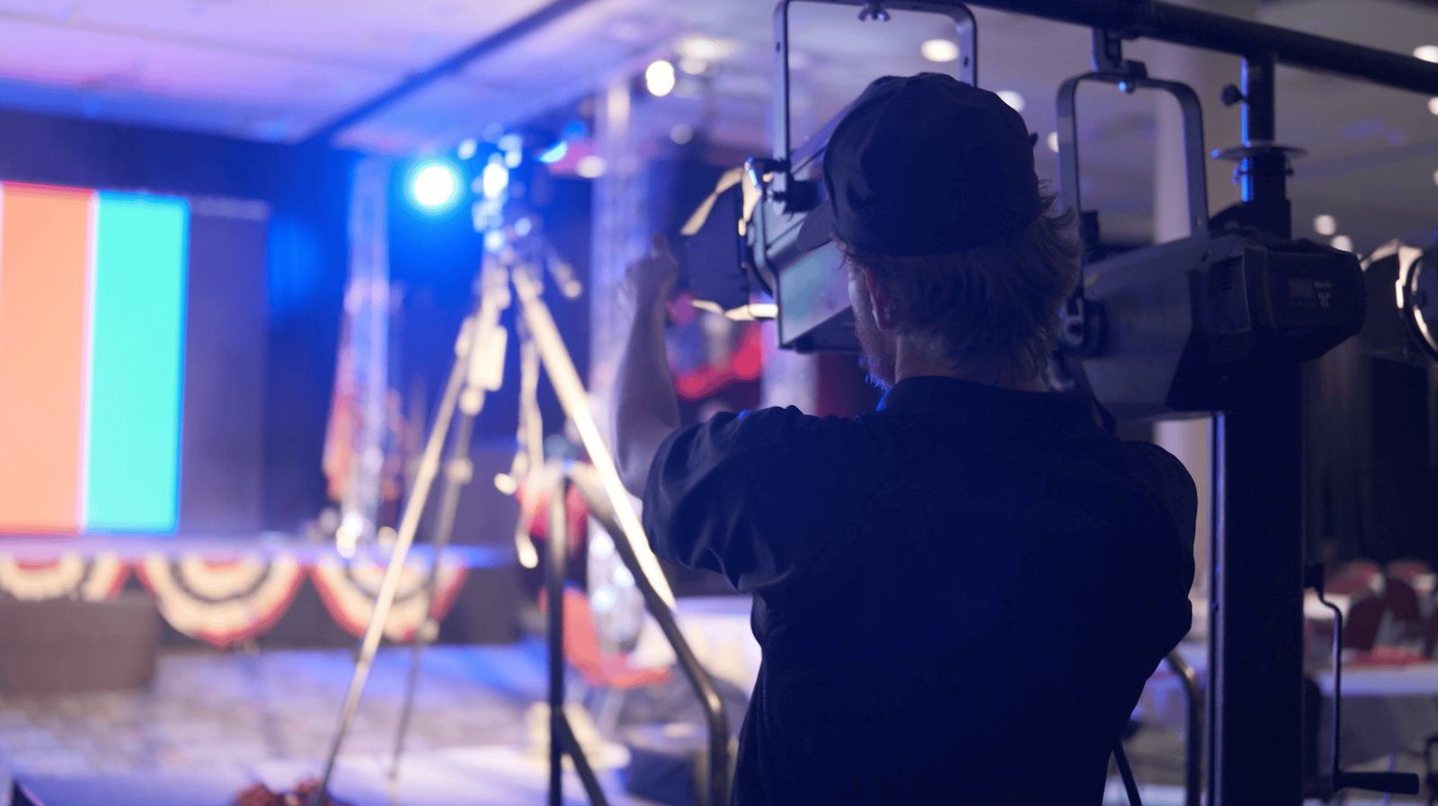 Filming the program for the live feed and in-house IMAG